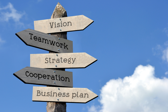 Vision, teamwork, strategy, cooperation, business plan - wooden